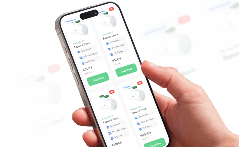 Человек держит смартфон с открытым мобильным приложением для выбора и покупки товаров, отображающим цены, скидки и характеристики продукции Мобильное приложение с каталогом товаров на экране смартфона