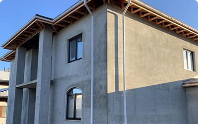 Штукатурные работы в частных домах, коттеджах и таунхаусах Изображение коттеджа