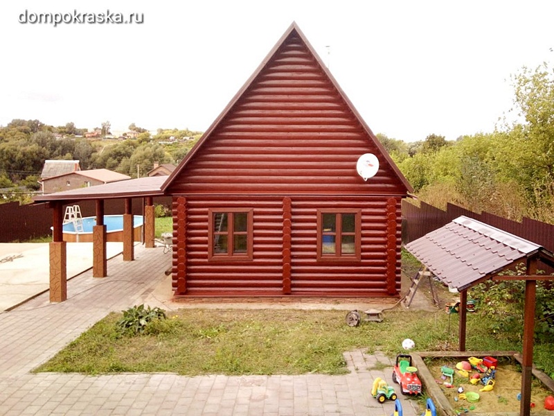 Обновление покраски дома из бревна